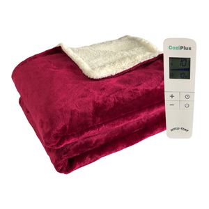 Neatly folded raspberry red heated throw with controller